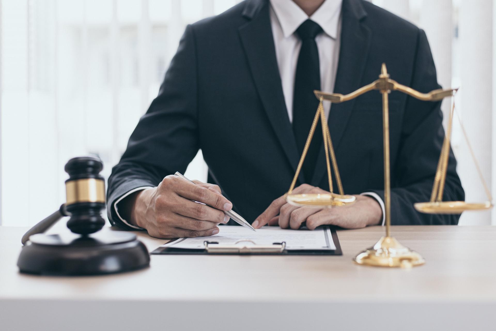 lawyer signing document